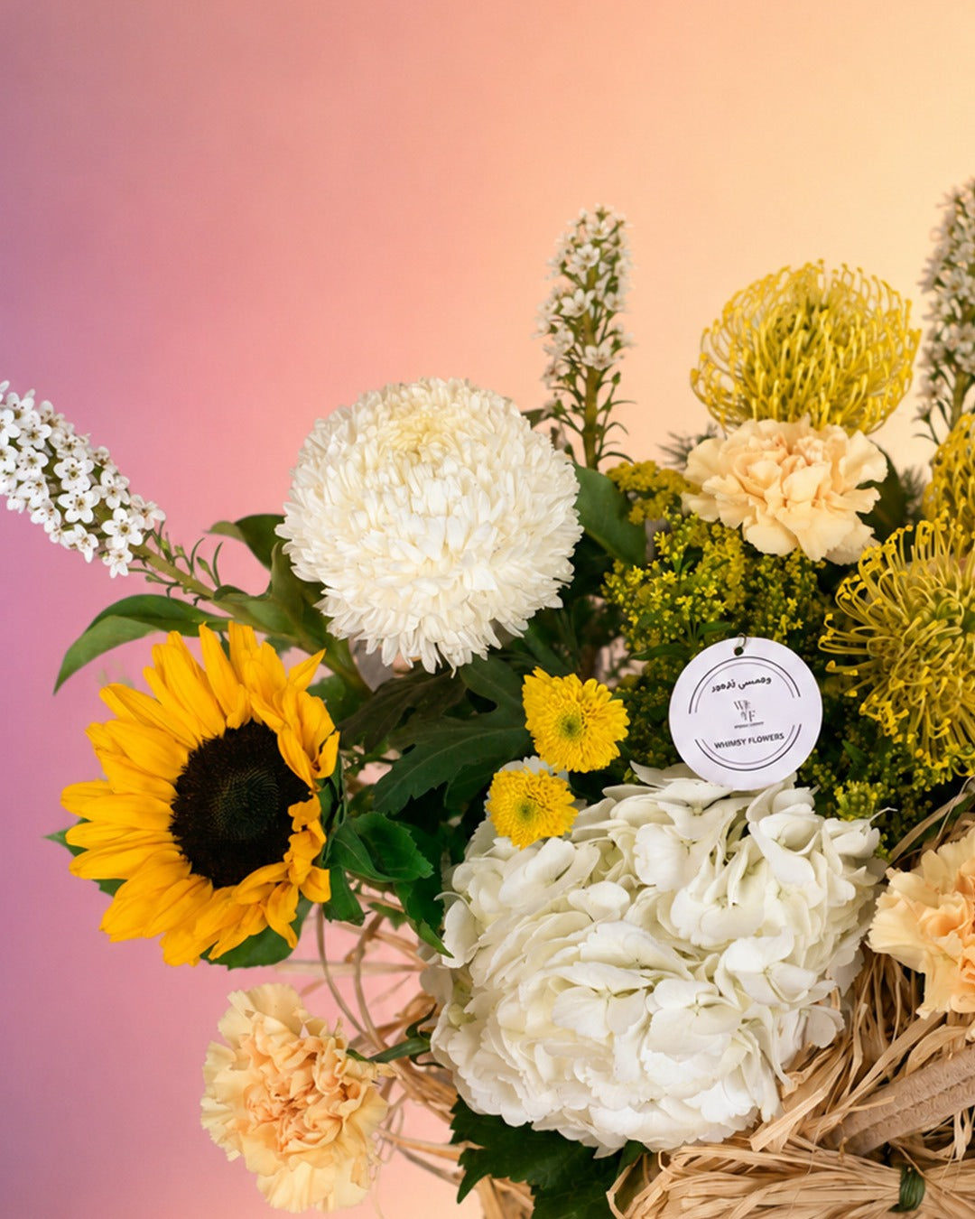 Countryside Charm flower basket arrangement with rustic mixed blooms in a woven basket from Whimsy Flowers Abu Dhabi.