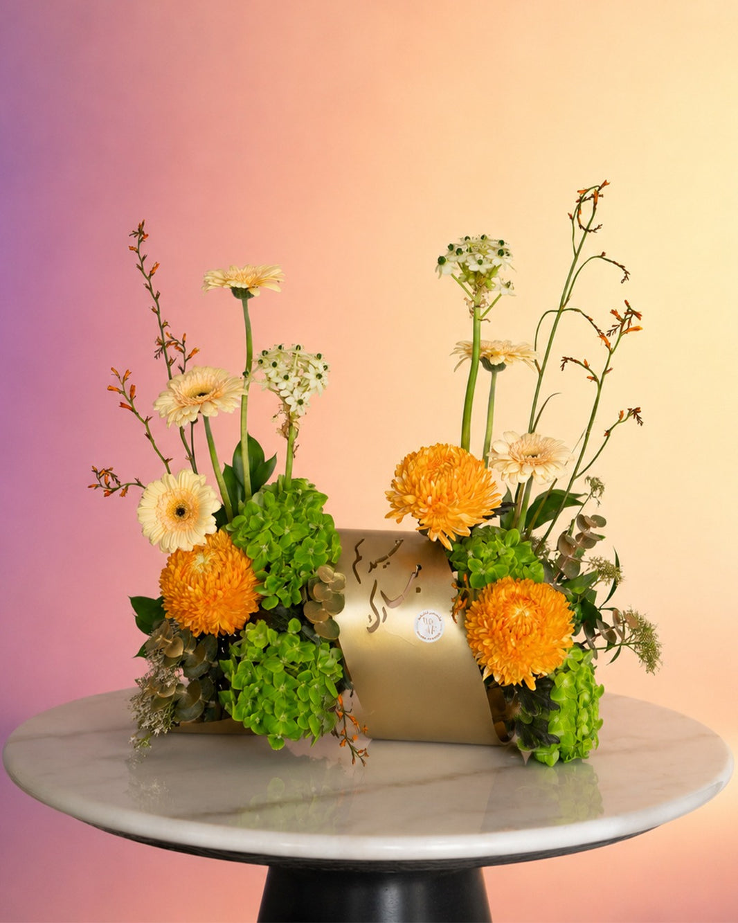 Golden Meadow flower tray arrangement with bright orange and wildflower blooms from Whimsy Flowers Abu Dhabi.