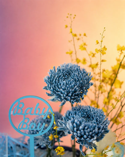 Little Prince new born baby flower bloom box with blue florals and balloon accent from Whimsy Flowers Abu Dhabi.