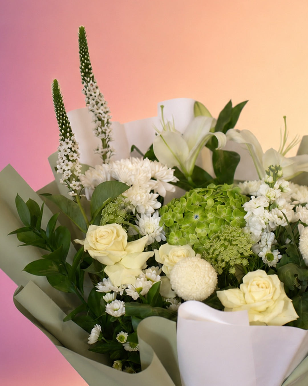 Moonlight Garden flower bouquet with elegant white blooms and soft greenery from Whimsy Flowers Abu Dhabi.