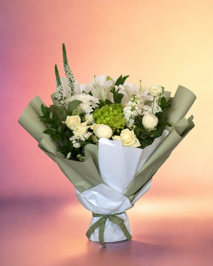 Moonlight Garden flower bouquet with elegant white blooms and soft greenery from Whimsy Flowers Abu Dhabi.