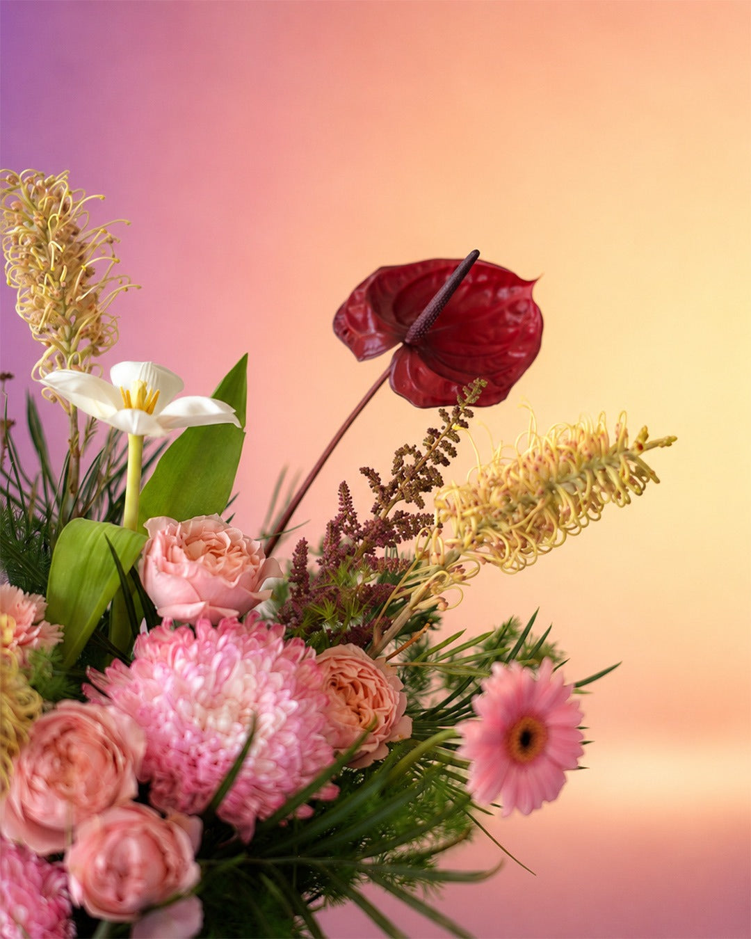 Pink Rhapsody flower bouquet with soft pink dried florals in a stylish carry bag from Whimsy Flowers Abu Dhabi.